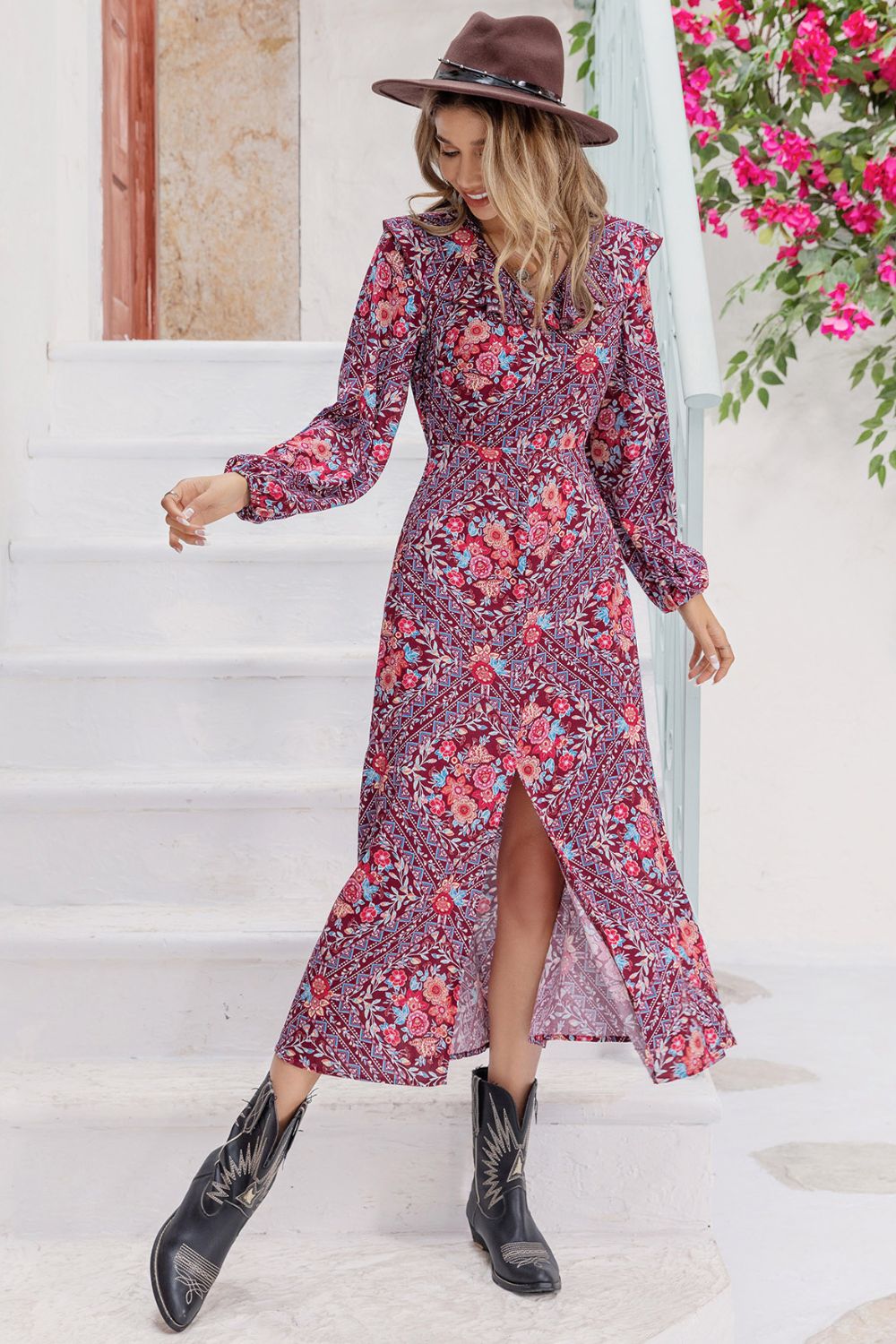 Bohemian ruffle collar maxi dress in purple with a floral print and high slit.