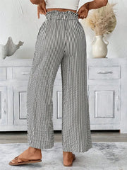 Striped paper bag maternity pants with a ruffled waist and wide leg
