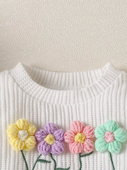 Baby girls' white waffle knit top with colorful floral appliques and embroidered stems.