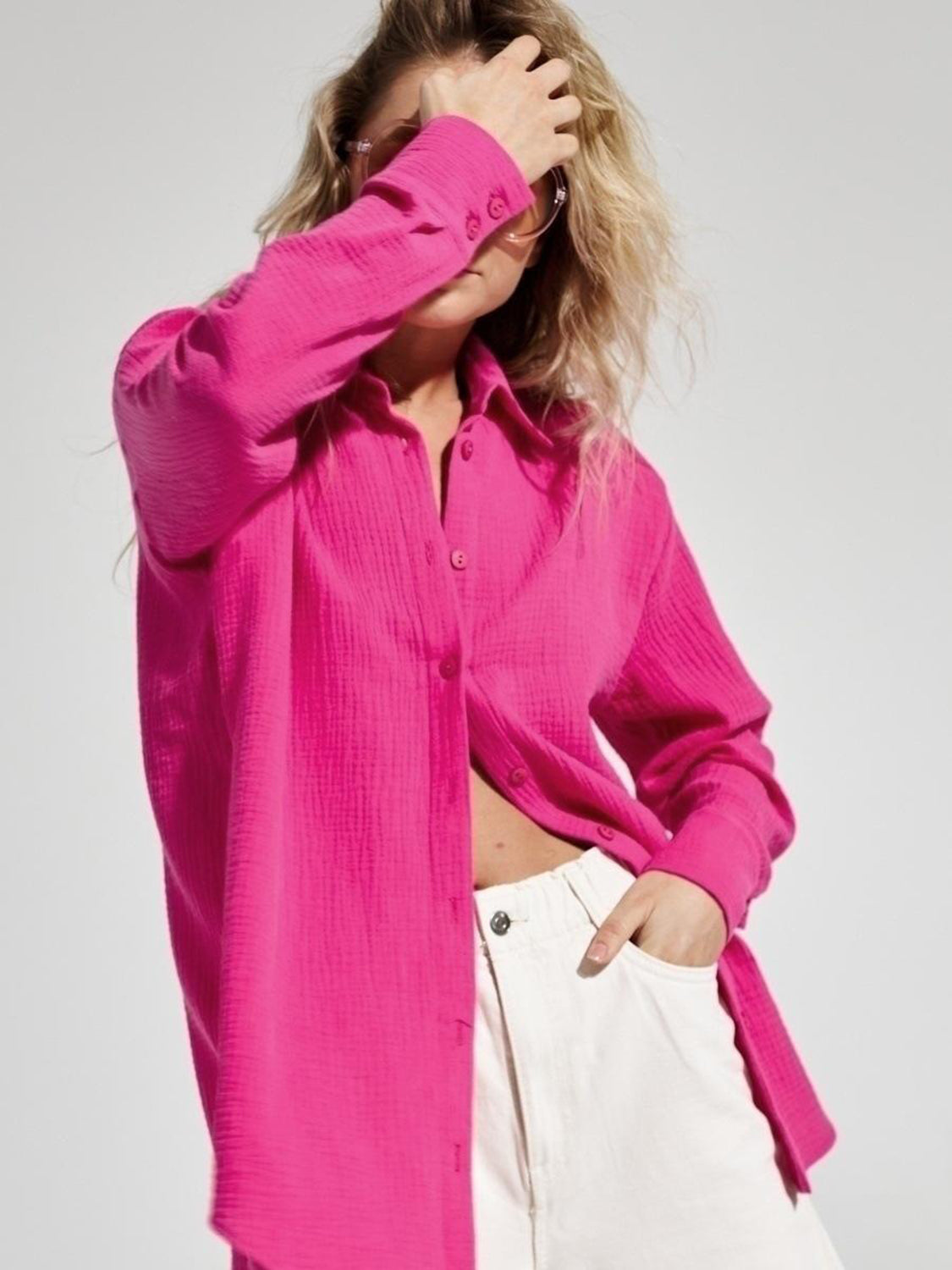 Textured cotton overshirt in hot pink with relaxed fit and button front.