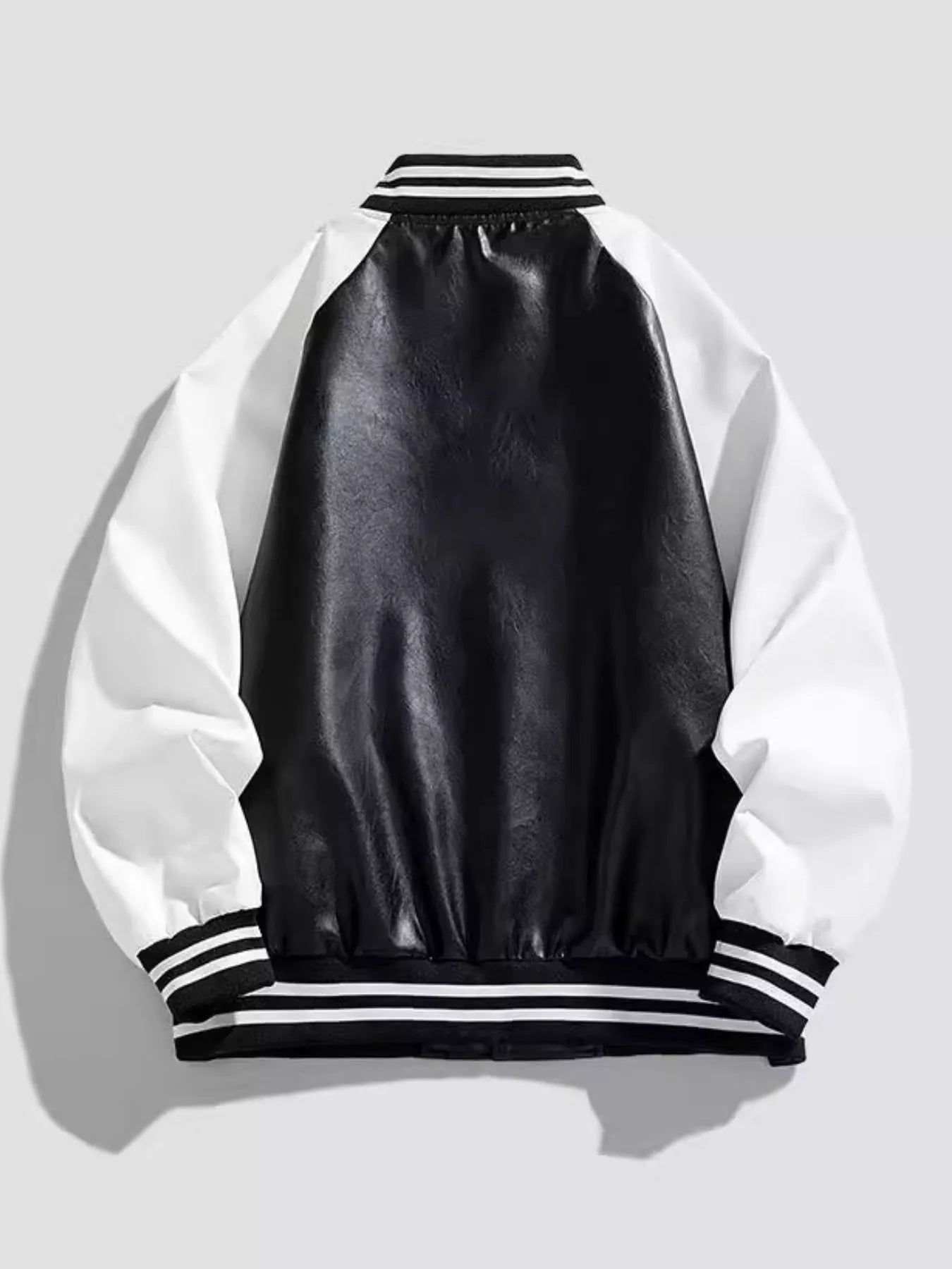 Men's black and white varsity jacket with striped collar and cuffs
