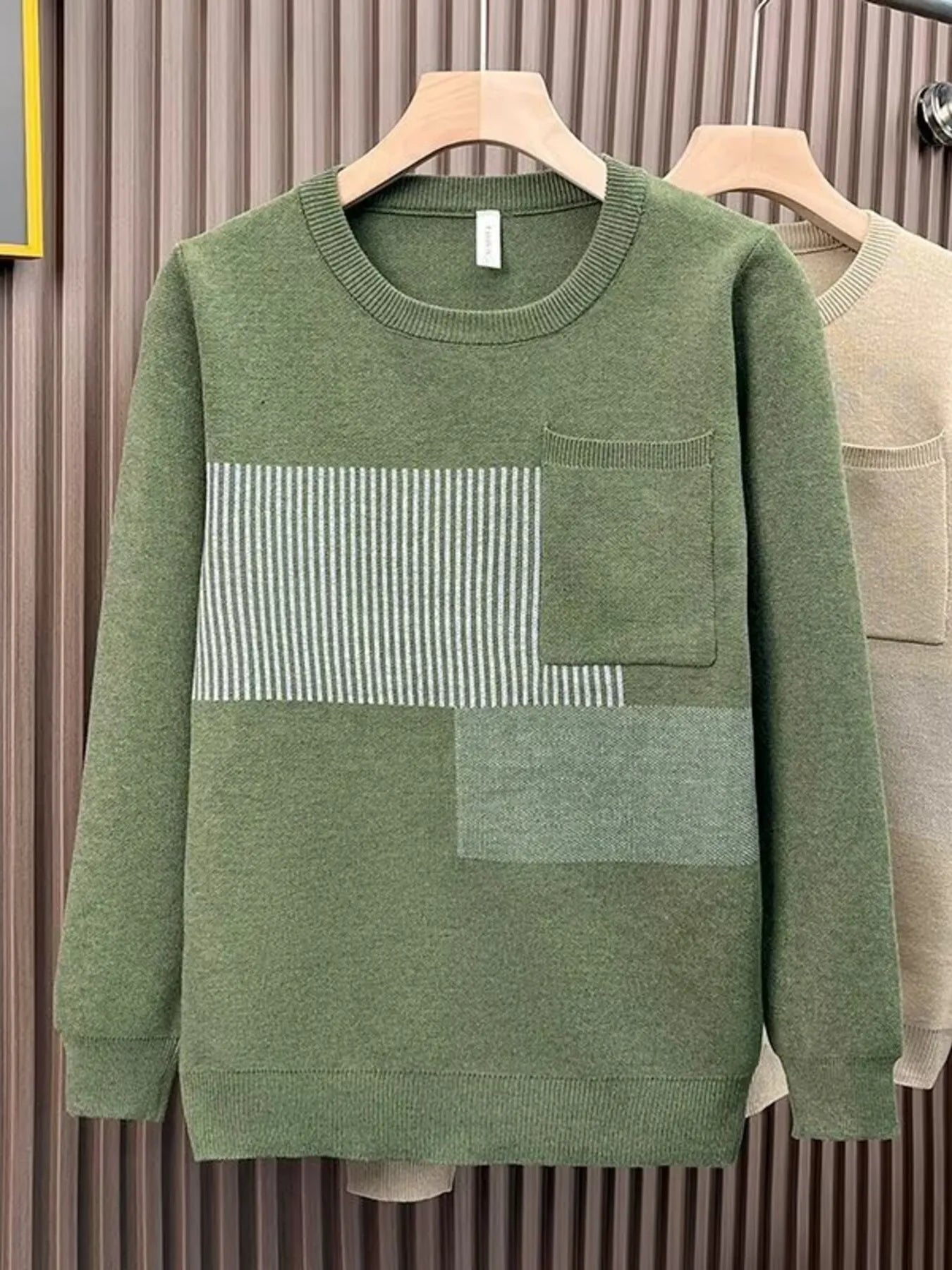 Men's green long sleeve sweater with chest pocket and striped detail