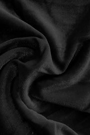 Black plush velvet wide-leg trousers with subtle ribbing detail