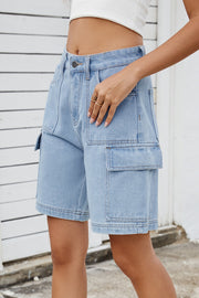 Medium wash denim cargo shorts with utility pockets and a relaxed fit.