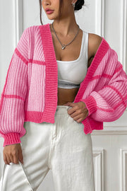 Colorblock ribbed open cardigan in pink with balloon sleeves and a relaxed fit.