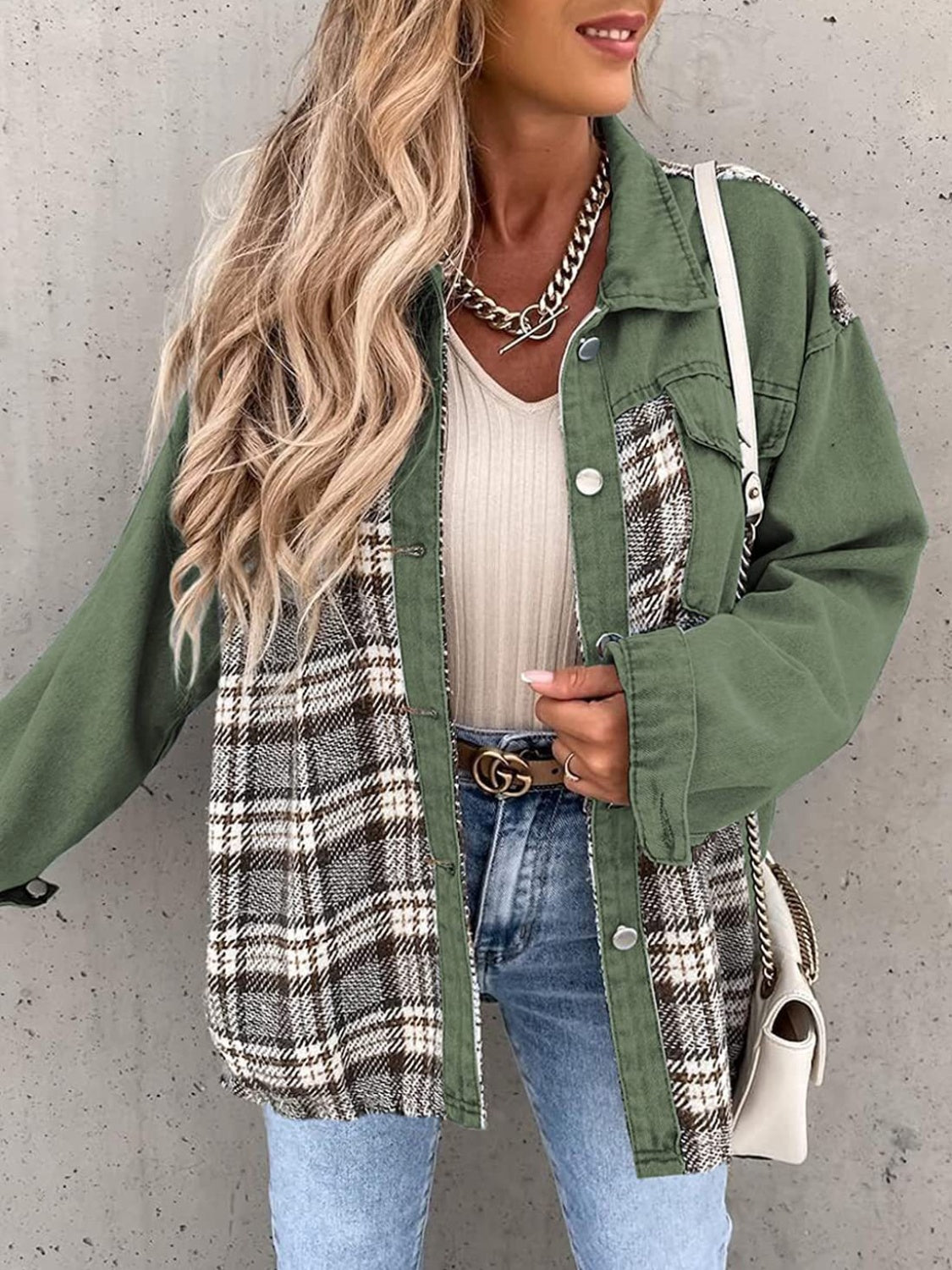 Panelled plaid denim hybrid jacket in green with button front and plaid inserts.