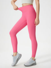 Pink ribbed high-waist leggings with a full-length cut.