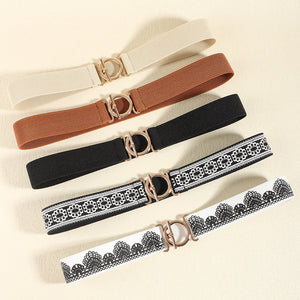 Elasticated belts in caramel, black, and ivory with circle buckle and decorative trim options