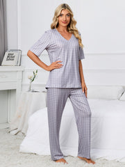 Geometric print V-neck lounge set in Cloudy Blue, with short sleeves and matching pants.