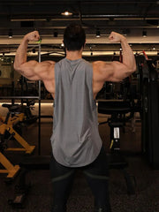Gray performance tank top with subtle branding, showing back view.