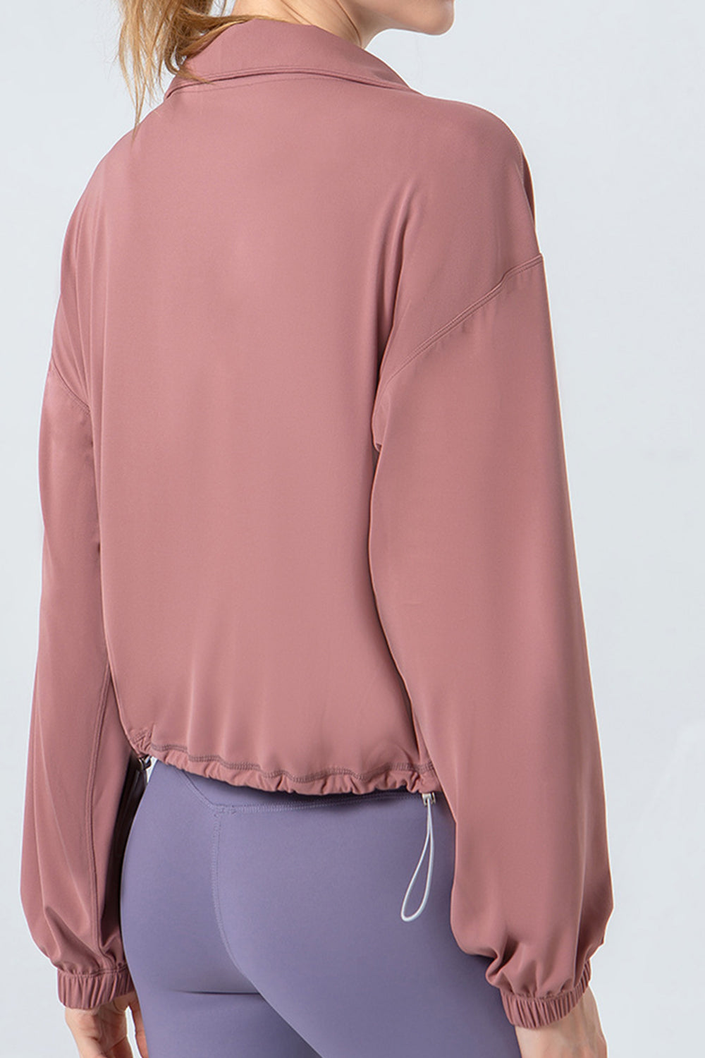 Dusty pink active jacket with gathered hemline and drawstring detail