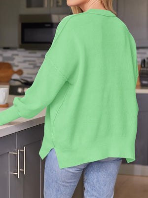 Neon Green ribbed-knit relaxed fit sweater with crew neck and long sleeves.