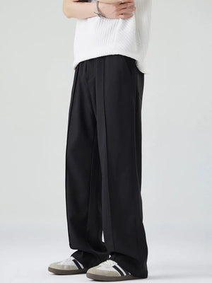 Black casual drawstring sweatpants with a relaxed fit and front seam detail.