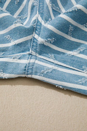 Striped distressed denim overalls with wide legs and frayed details.
