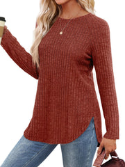 Burgundy ribbed knit sweater with raglan sleeves and asymmetric hem detail.