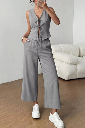 Gray lace-up tie front crop top and wide-leg pants set with V-neck.