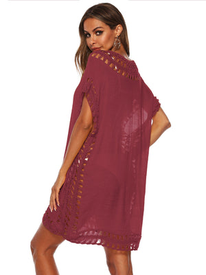 Burgundy kaftan cover-up with crochet trim details and short sleeves.