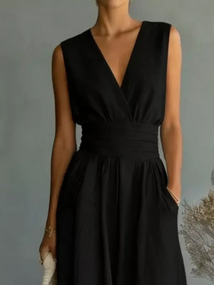 Black sleeveless wide-leg jumpsuit with V-neck, cinched waist, and pockets.