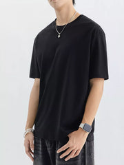 Black cotton crewneck t-shirt for men with short sleeves and a relaxed fit.