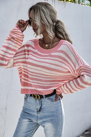 Cropped knit crew neck sweater with pink and white stripes.