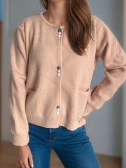 Dusty Pink ribbed knit button-up cardigan with playful pastel buttons and pockets.