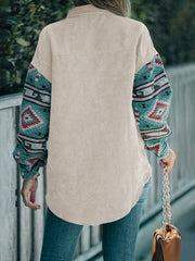 Corduroy shacket in Dust Storm with Aztec print sleeves and collar.