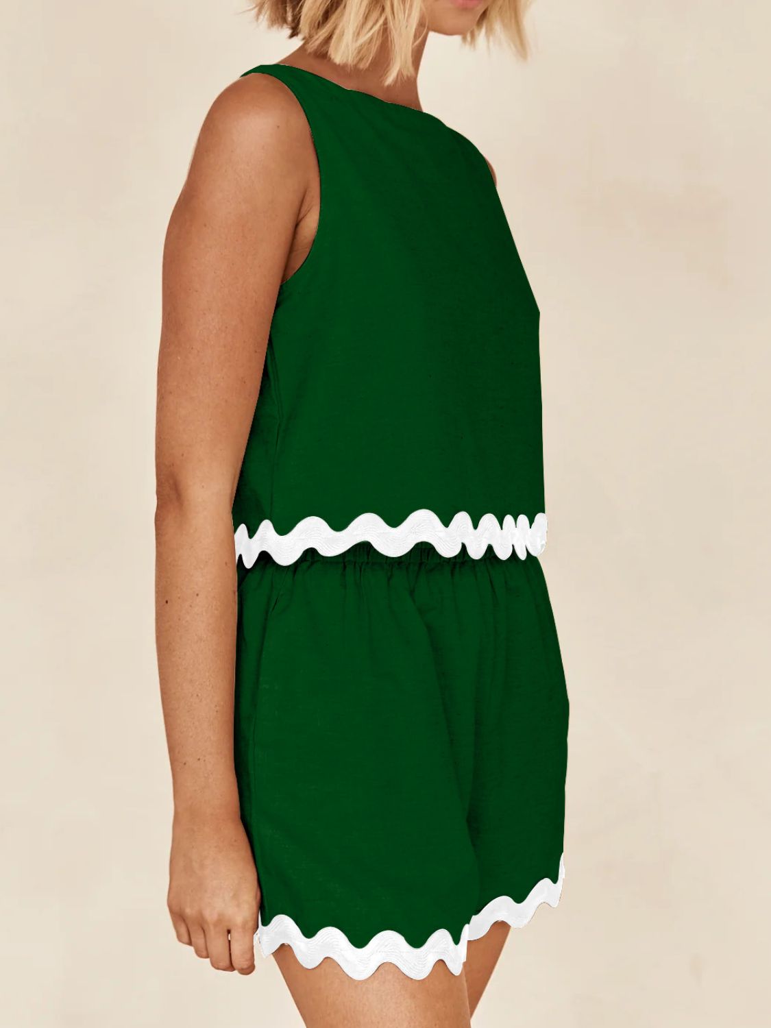 Dark green scalloped edge tank and short co-ord with white trim.