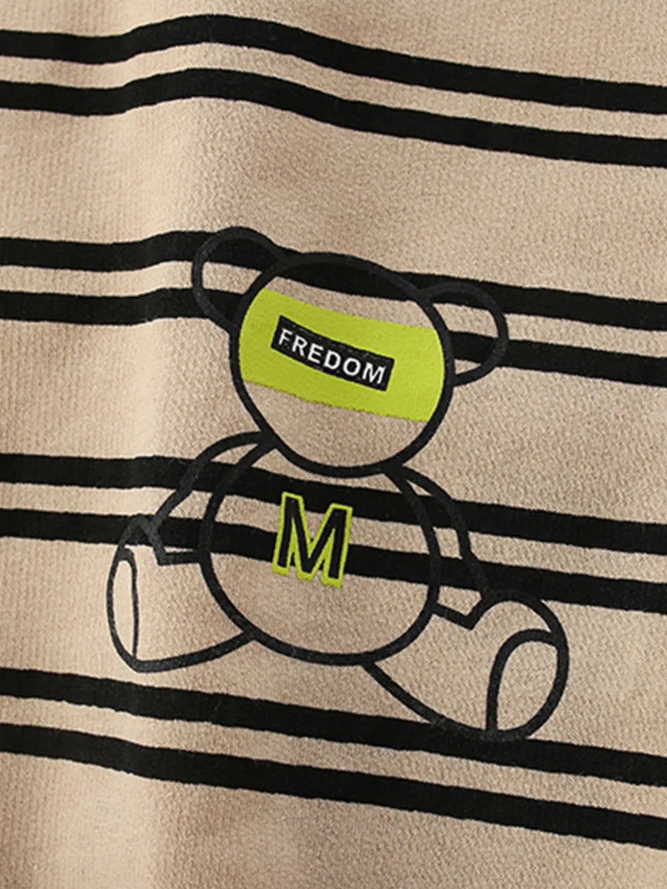 Tan striped cotton crew neck sweatshirt with a bear graphic and "FREEDOM" text detail.