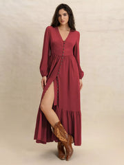 Burgundy plus-size maxi dress with balloon sleeves, V-neck, button front, and high slit.