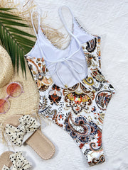 White paisley print one-piece swimsuit with tie-back detail