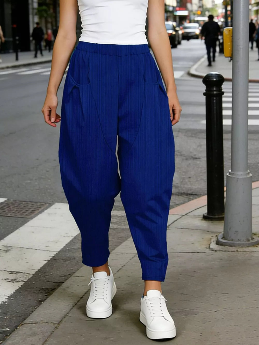 Royal blue harem pants with pockets and subtle vertical stripes
