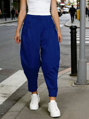 Royal blue harem pants with pockets and subtle vertical stripes