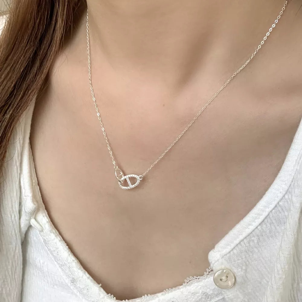 Geometric zircon adorned silver necklace with delicate chain