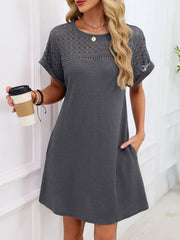 Dark gray t-shirt dress with lace yoke and sleeves, above-knee length, pockets.