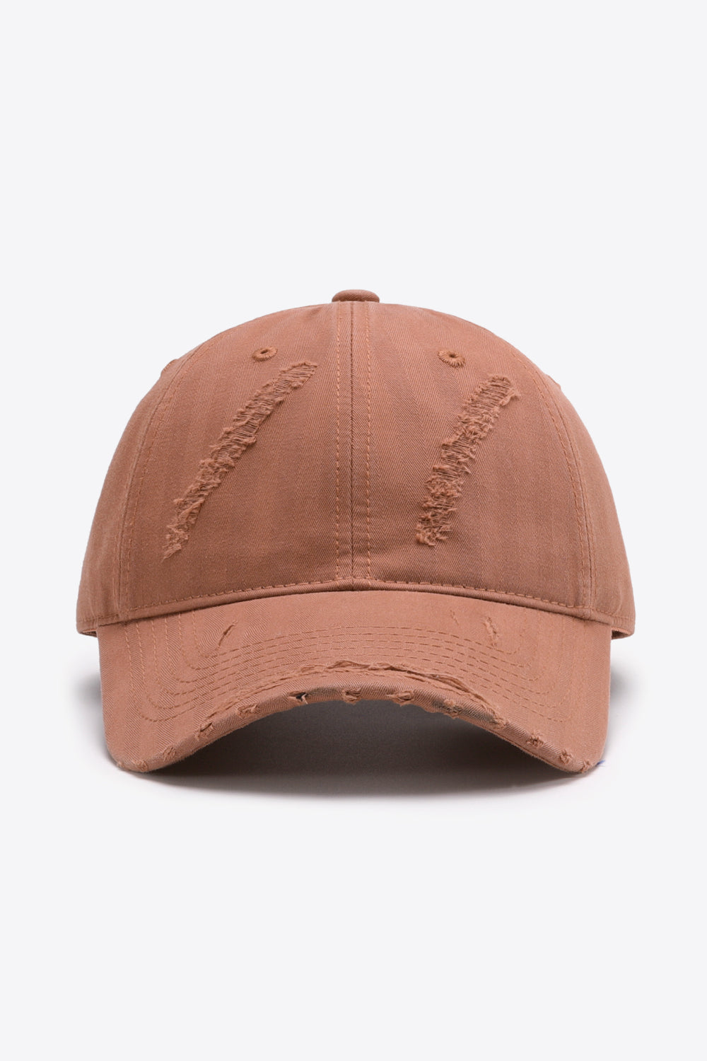 Rugged baseball cap in coral with distressed details and adjustable fit