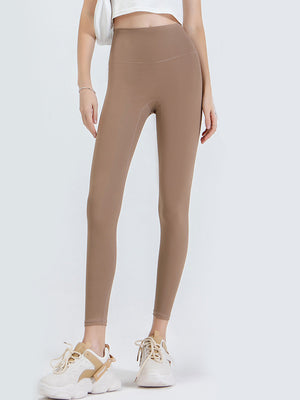 Caramel high-waist leggings with a sculpted contour fit.