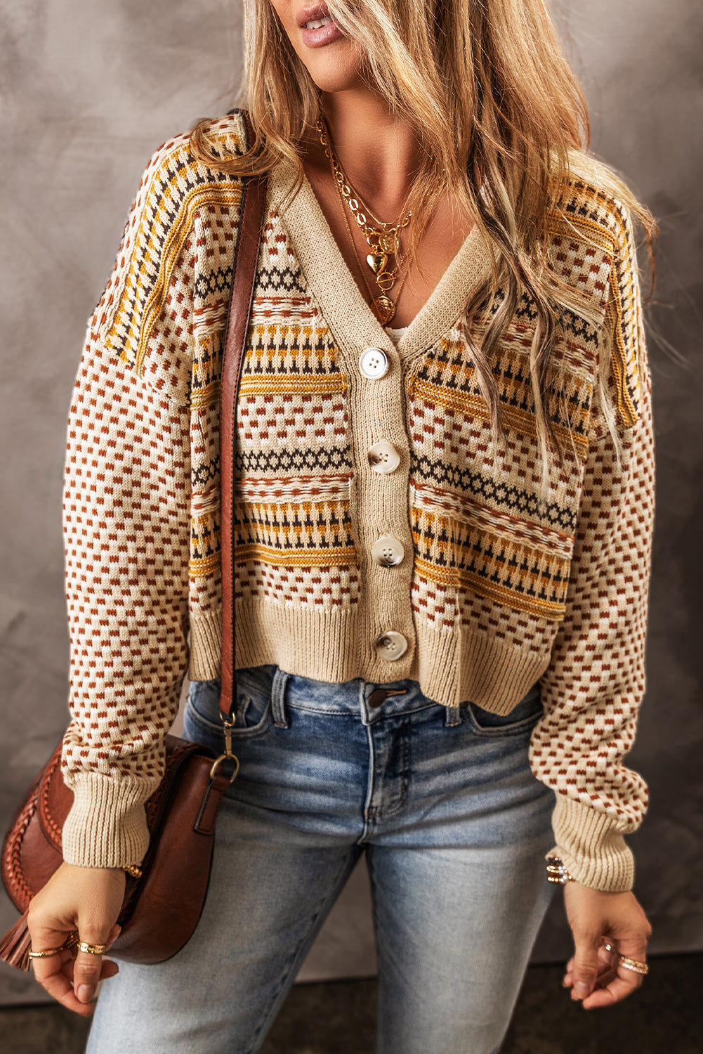 Geometric knit cropped cardigan in khaki with button front and v-neck.