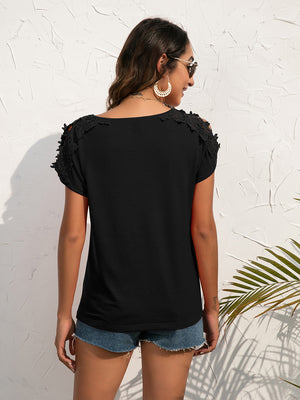 Black t-shirt with lace shoulder detail and short sleeves.