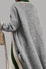 Gray hooded knit maxi cardigan with color-blocked stripes and pockets.