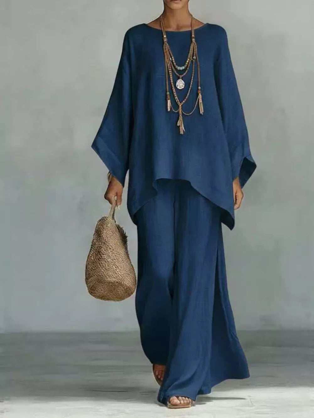 Full Size Round Neck Top And Wide Leg Pants Set in Black, fabric detail