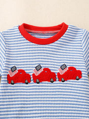 Baby tee with blue and white stripes, red collar, and embroidered red cars with American flags.