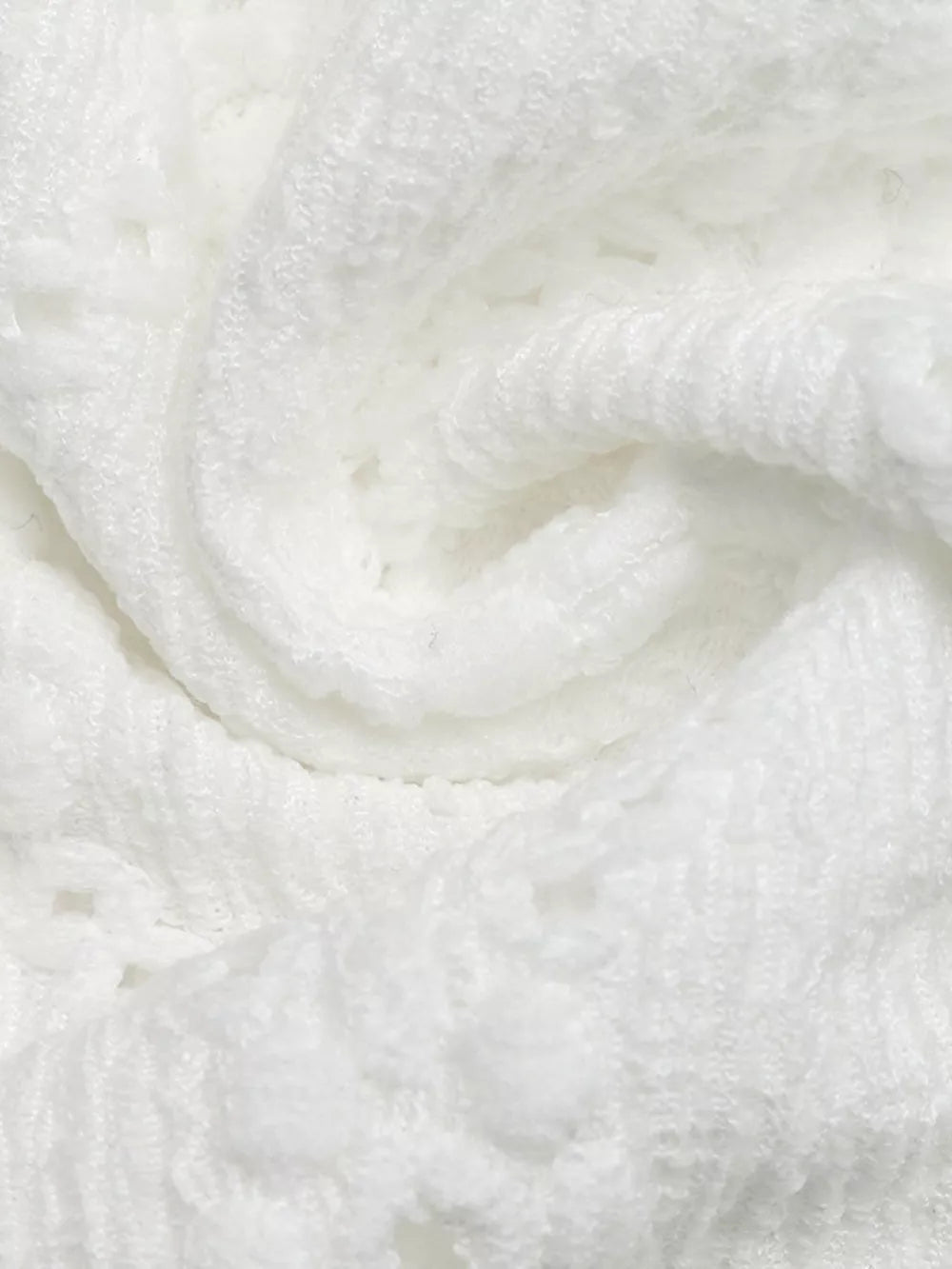 White lace-trimmed ruffle sleeve maternity shirt detail