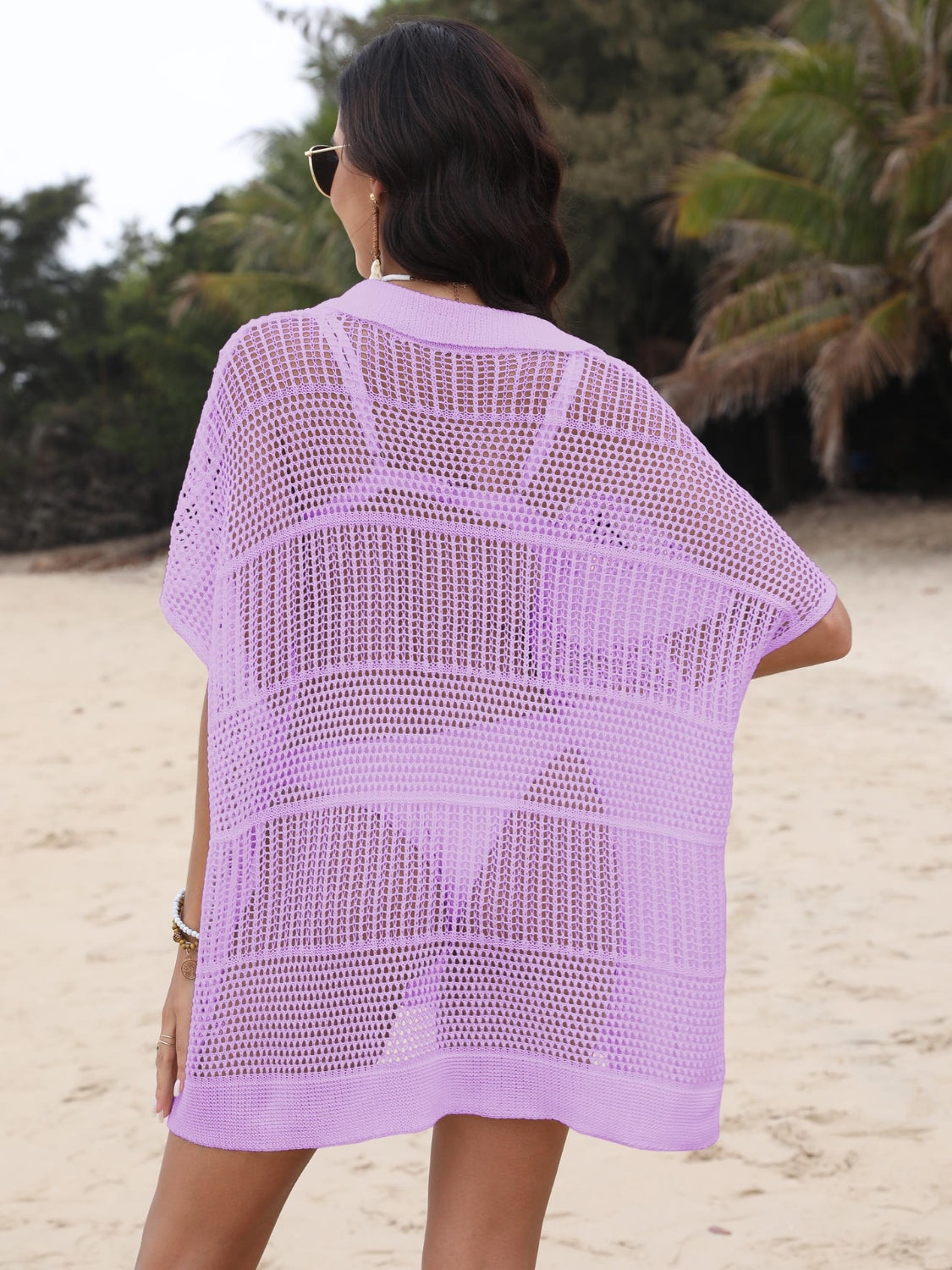 Lavender open-knit polo beach dress with short sleeves and a relaxed fit, worn over a swimsuit.