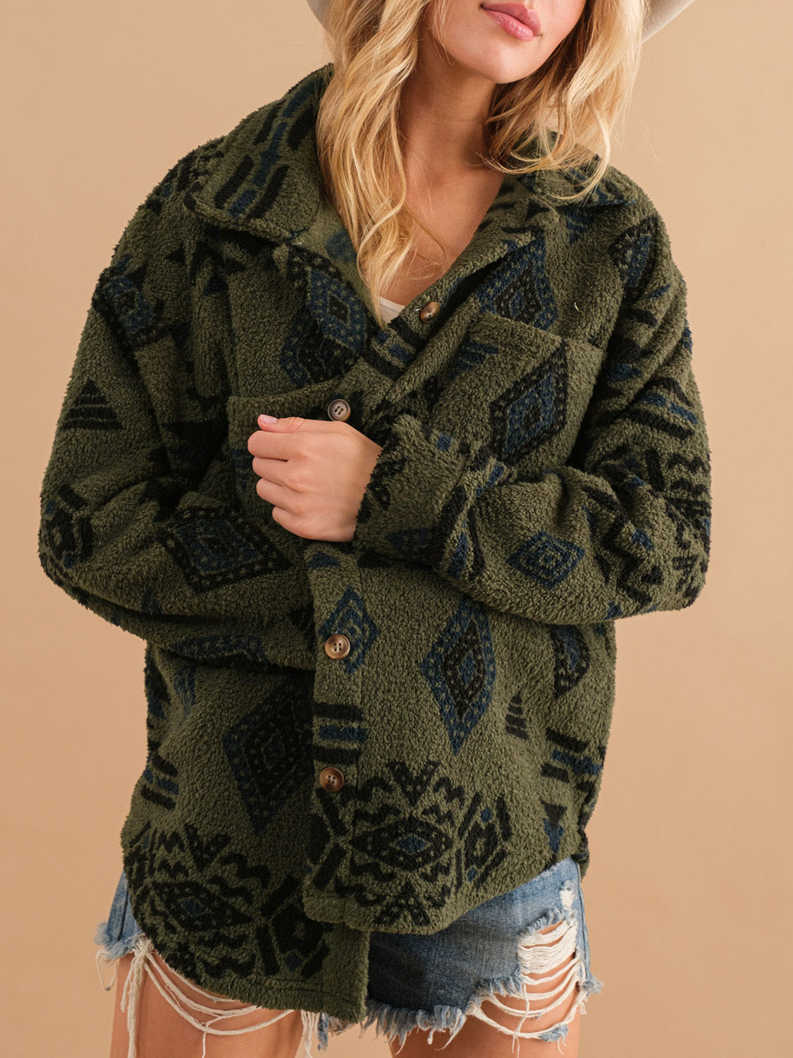 Overshirt jacket in Black Forest sherpa with bold Aztec pattern, button front and chest pocket.