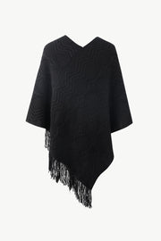 Black geometric knit poncho with V-neck and fringe detail
