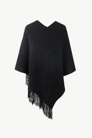 Black geometric knit poncho with V-neck and fringe detail
