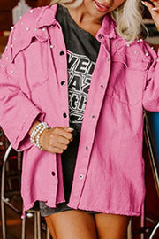 Fuchsia pink raw-edge utility jacket with pearl embellishments and frayed hem.