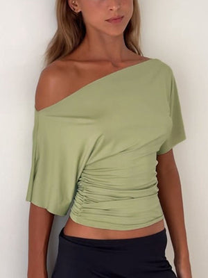 Sage ruched one shoulder t-shirt with asymmetrical neckline and short sleeves.