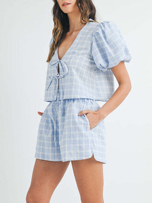 Light blue plaid puff sleeve tie-front crop top and drawstring shorts set
