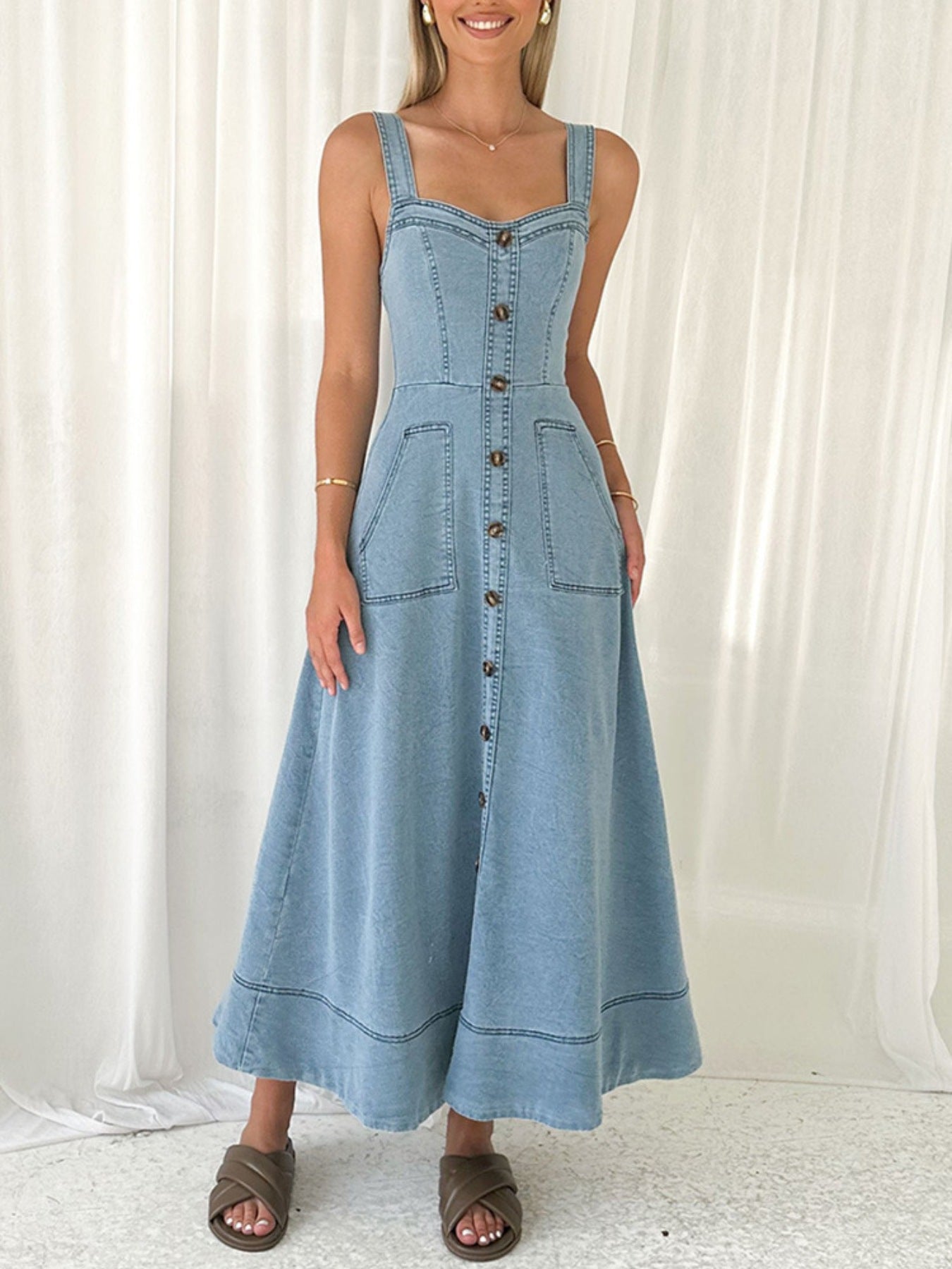Chic A-line denim midi dress with button front, square neckline, and patch pockets.